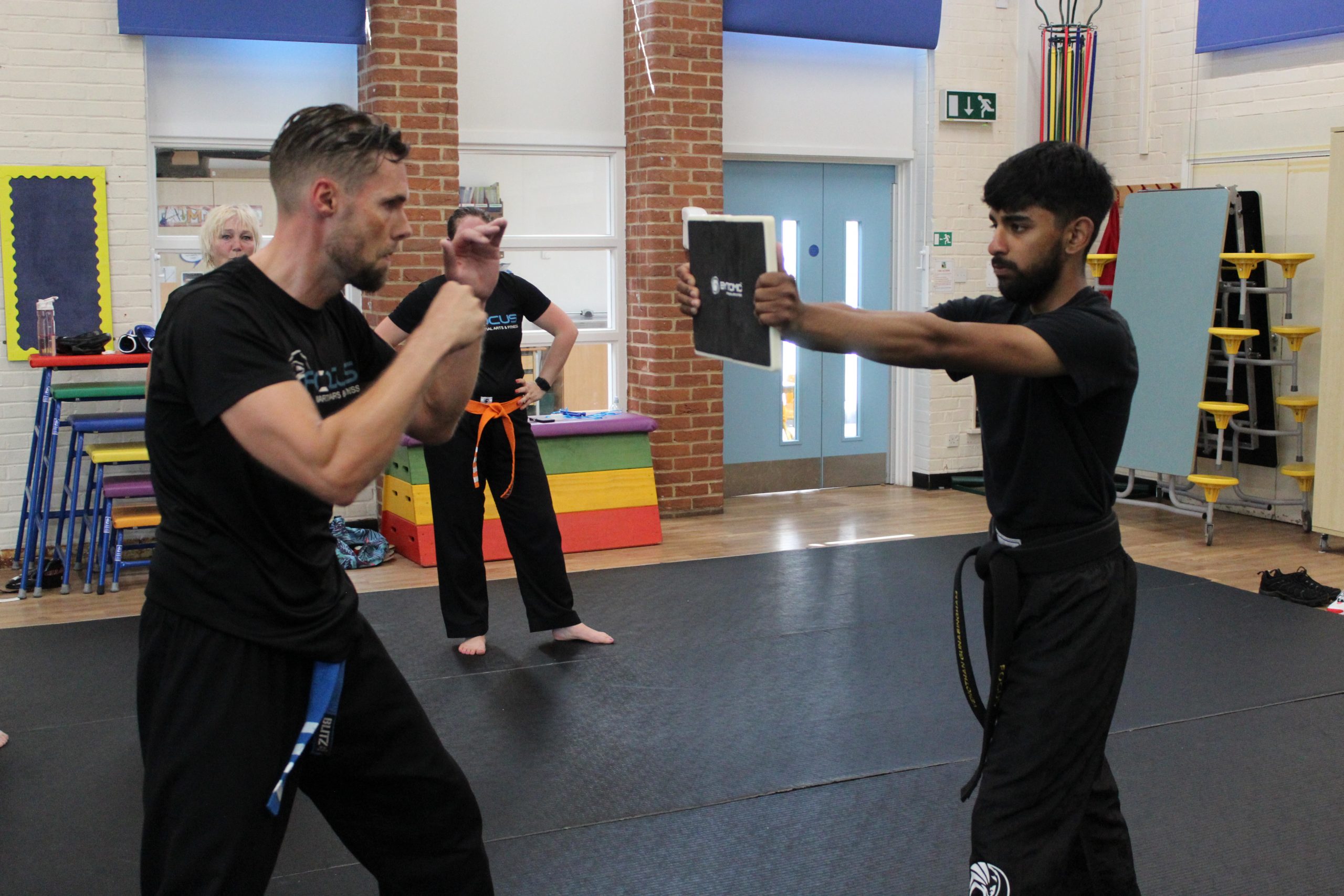 Focus Fitness students training technique in class
