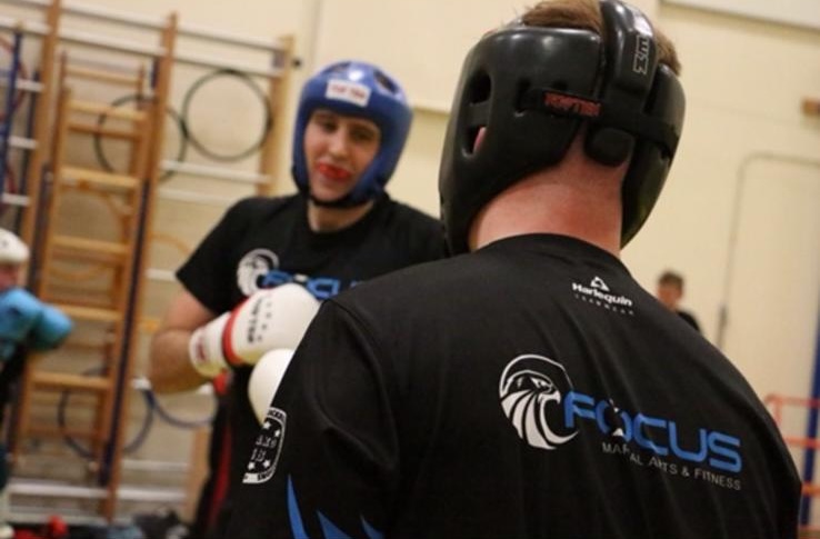 Two students sparring in Focus Fitness kit